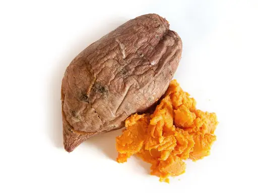 Batata cocida y triturada, una porción que aporta unos 50 gramos de carbohidratos.