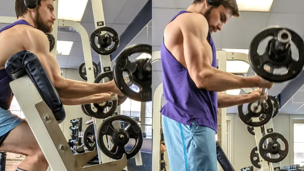 Hombre concentrado realizando ejercicios de antebrazo con polea y barra en el gimnasio.